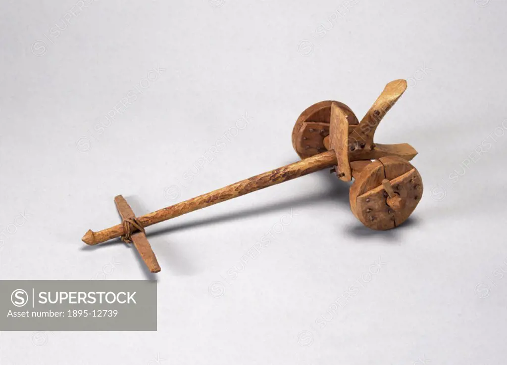 Scale model of a simple chariot with two solid wooden wheels. The two-wheeled chariot was invented by the Sumerians in Mesopotamia probably some time ...
