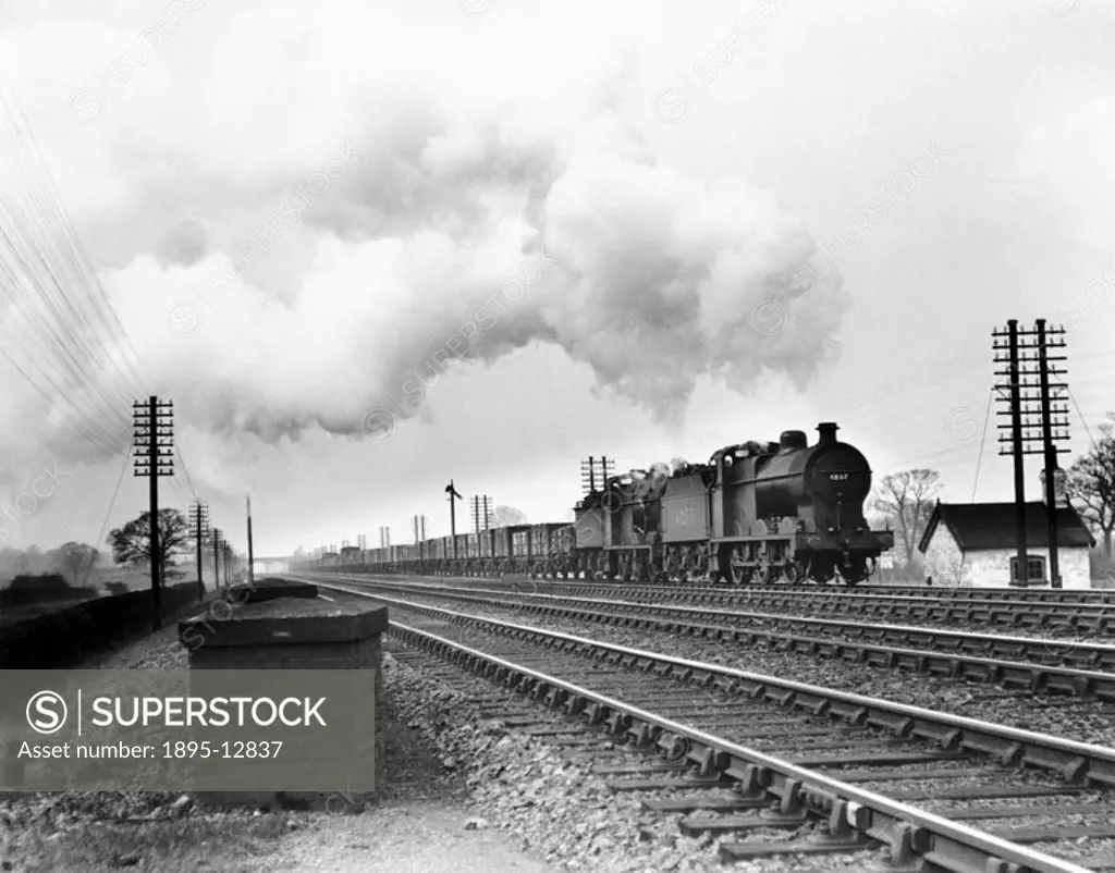 Two Class 4F 0-6-0 steam locomotives head a typical coal train for Cricklewood, London, on the Midland Main Line.