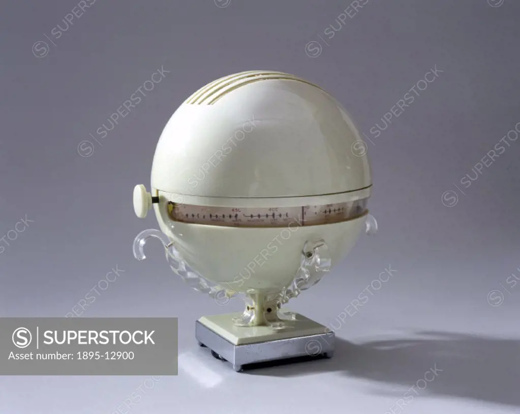 This radio, produced by the Champion Electric Corporation Ltd, is made of acrylic and is in the form of a globe. It is supported on four twisted trans...