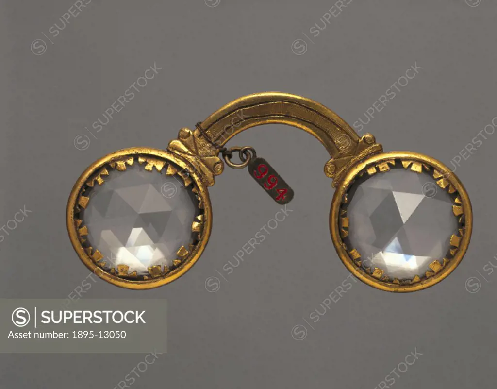 Multiplying spectacles comprising a pair of rock crystal ´lenses´, each with 24 facets, in a gilt metal frame. Spectacles have been in use in the West...