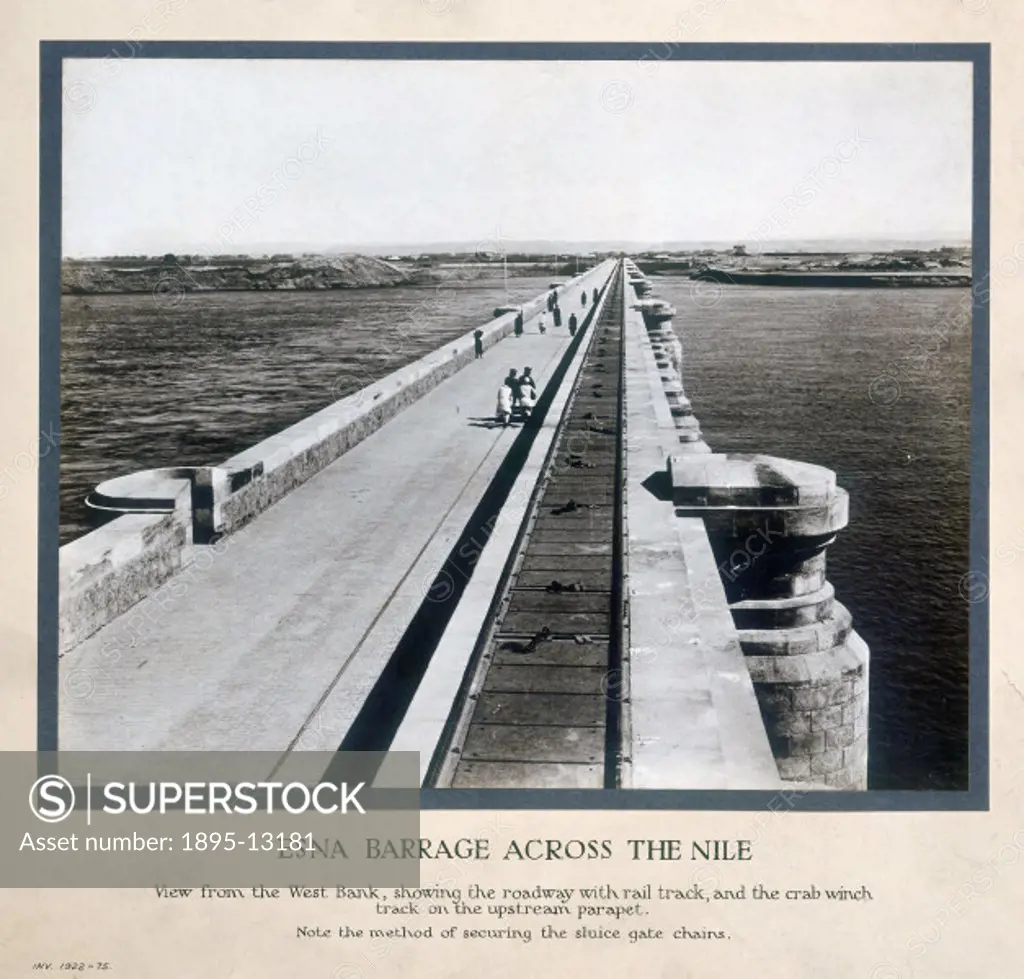 ´View from the West Bank, showing the roadway with rail track, and the crab winch track on the upstream parapet. Note the method of securing the sluic...