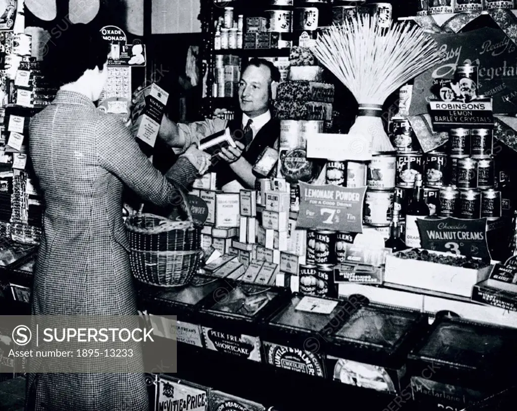 Woman buying groceries, 24 June 1937.