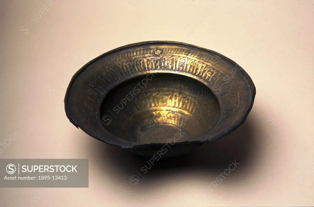 This copper gilt bowl, with a typical cut-out neck, was used to collect the blood from shaving cuts. In the 19th century most men visited the barber o...