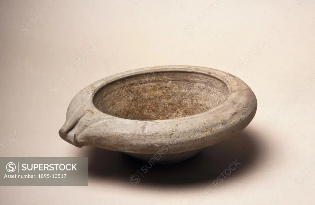 This earthenware mortar with a rim and pouring spout was found in Cheapside, London. Mortars were hard, strong bowls, which apothocaries used to crush...
