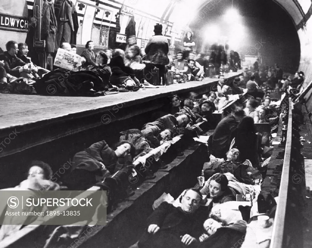 People resting and sleeping on the platform and track of Aldwych Underground Station in London during the Blitz.