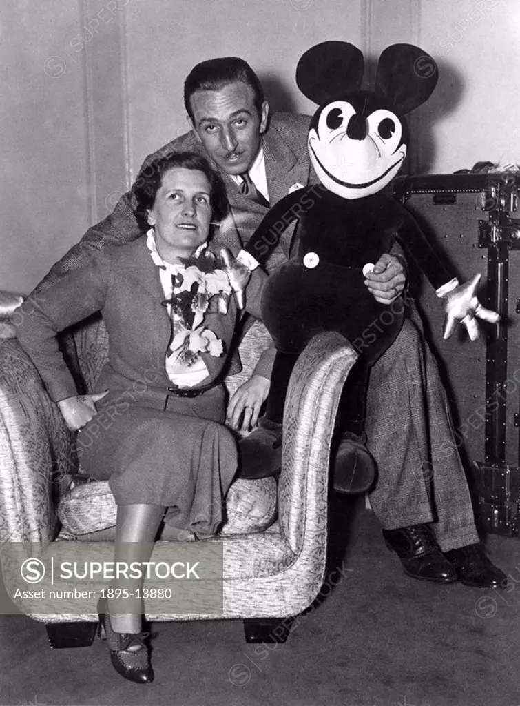 Mr and Mrs Walt Disney with Mickey Mouse, London, 21 June 1935.Walt Disney 1901_1966, American animator and showman, with his wife Lillian and one of ...