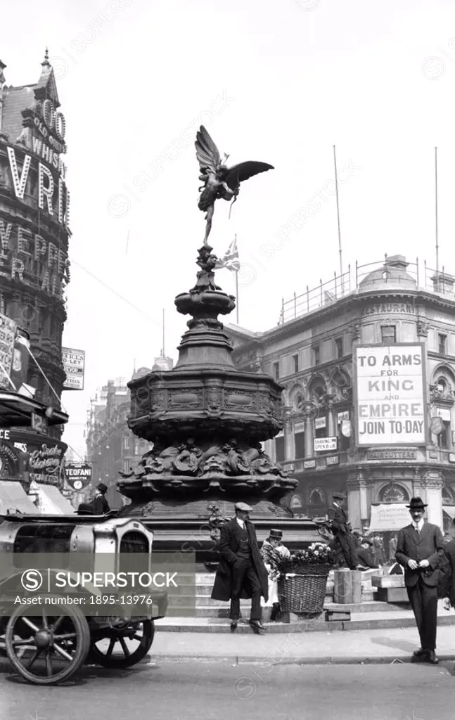 Flower seller on the steps of Eros. The hoarding which reads To Arms for King and Empire - Join Today’, suggests that the photograph may have been ta...