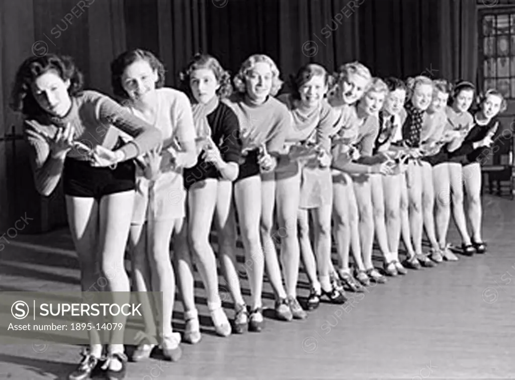 Chorus girls rehearsing, 25 November 1935. ´Rehearsal of ´Follow the Sun´ which will be in Manchester on 23 December and later at the Adelphi Theatre ...