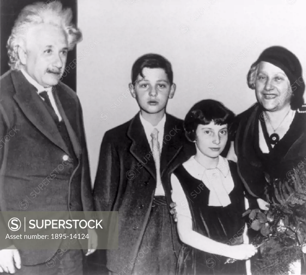 Einstein (1879-1955) with his wife, Elsa (1876-1936), and two of their children. Einstein made fundamental contributions to physics which include his ...