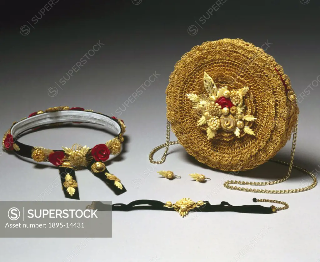 Twisted straw handbag, wreath, fabric choker, and straw earrings made by Freda Rudman, with applied straw floral decoration.
