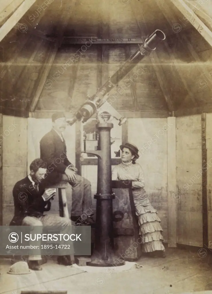 Photograph showing two men and a woman observing the transit of Venus through a telescope, Station D, Equatorial 12, 8th-9th December 1874. The transi...