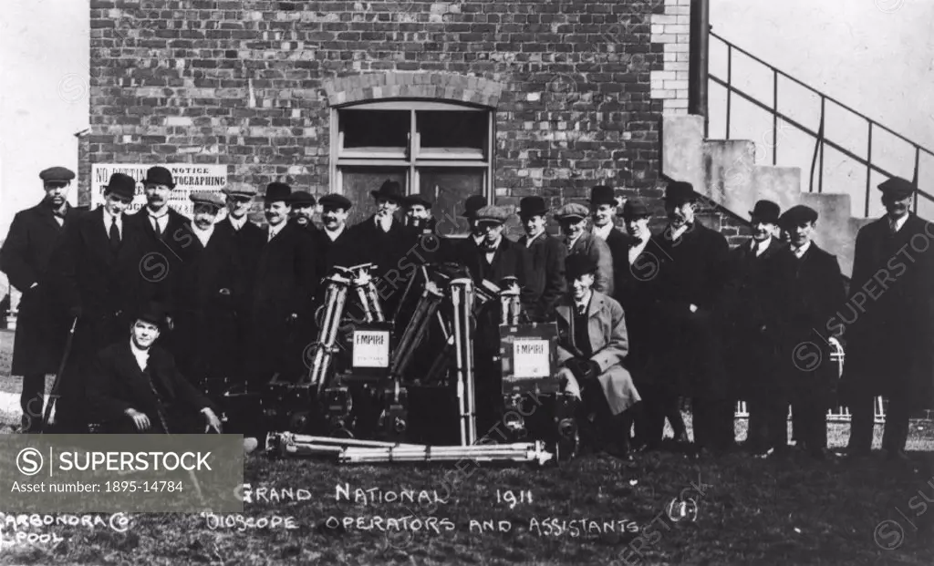 Bioscope operators and assistants, Grand National, Aintree, Liverpool, 1911.A group of filmmakers with their bioscope (early film camera) and other eq...