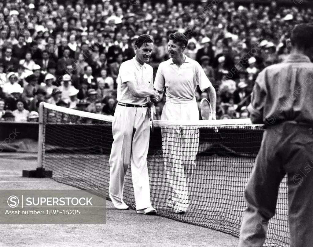 Tennis players Donald Budge and Von Cramm shaking hands following a match at Wimbledon, 3 July 1935.
