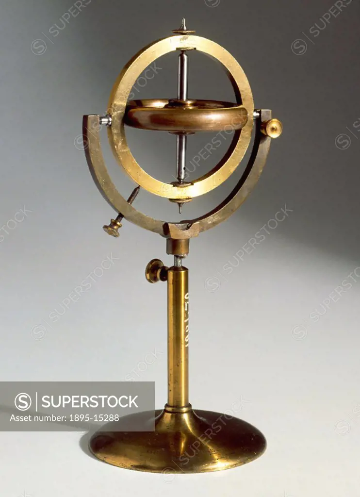 The gyroscope consists of a wheel-shaped rotor on an axle that is mounted inside a metal ring. The rotor is set spinning by winding a string around th...