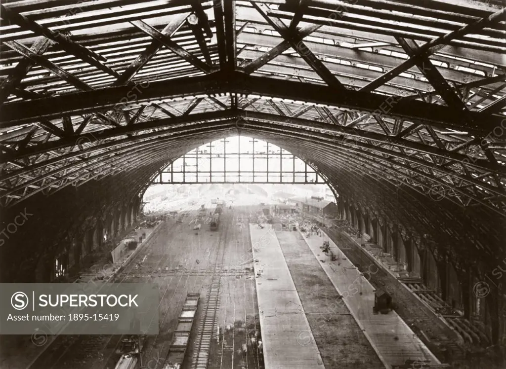 The roof of the train shed at St Pancras, designed by William Henry Barlow, seen here as construction reached its conclusion. ´This albumen print was ...