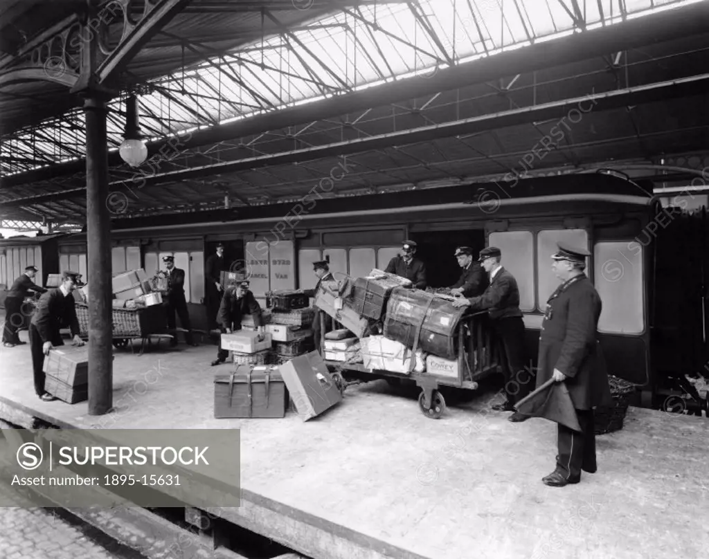 London & North Western Railway (LNWR) loading passengers´ luggage onto Parcel Van No 9729, possibly at Holyhead Station.