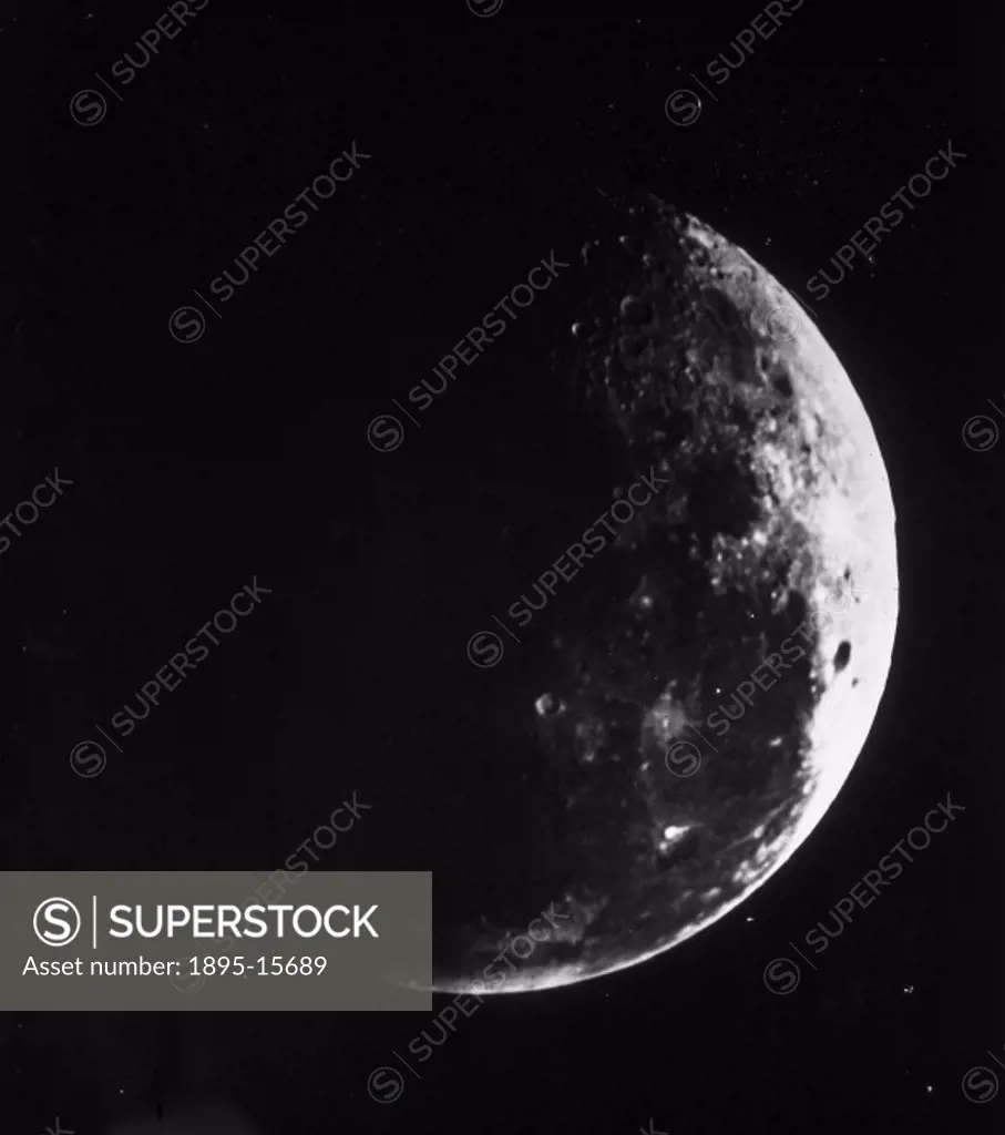 Photographic glass slide, taken around 1858-1862, shows the half-phase of the Moon in its first quarter. The picture taken by Warren De La Rue (1815-1...
