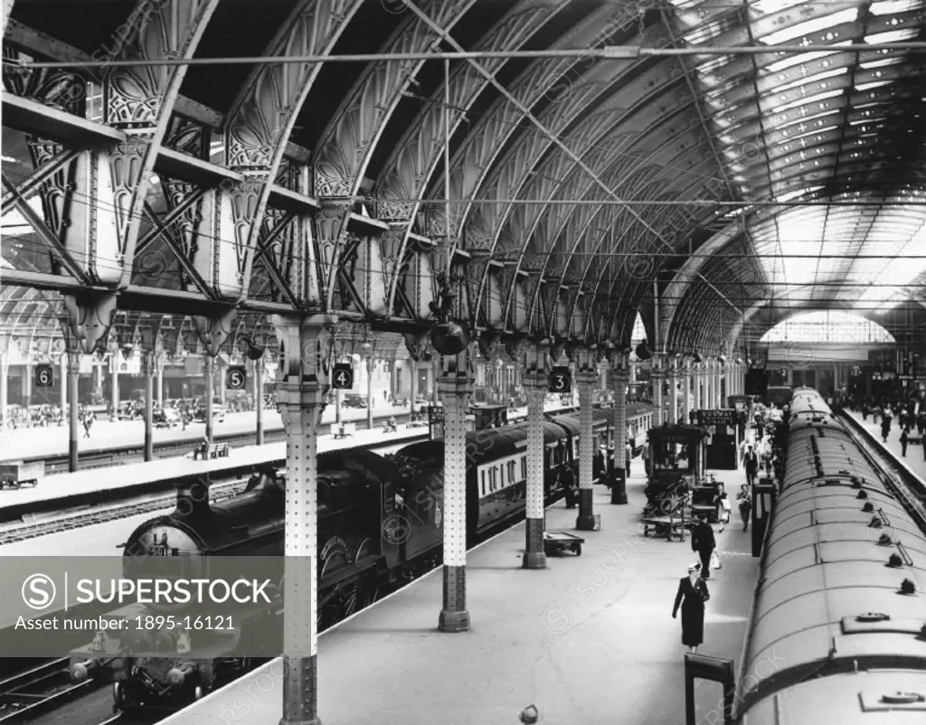 Maurice Earley´s photograph of Paddington´s sweeping arches and roofs, almost a hundred years after its opening. The picture shows locomotive No 5018 ...