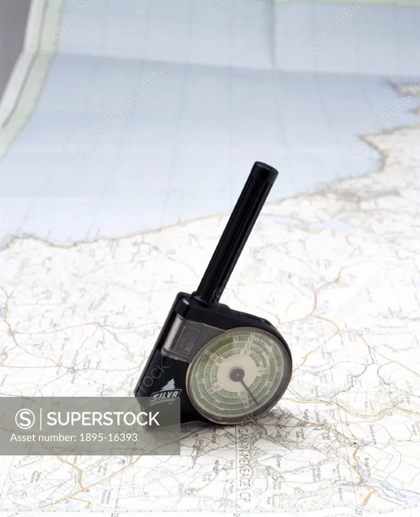 A map measurer for motorists and hikers, which has a black plastic casing with two dials, a magnifying glass and a zeroing revolution counter. Made in...