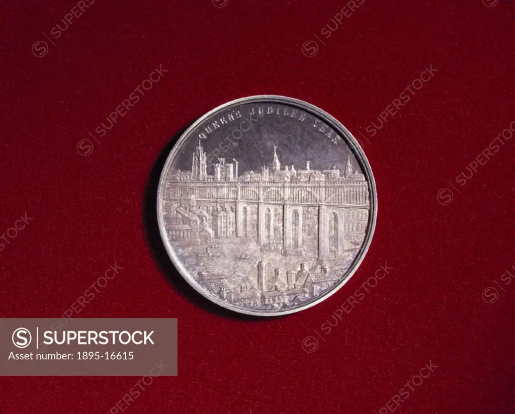 Medal celebrating the Newcastle-Upon-Tyne Trials and Industrial Exhibition of 1887. Obverse view showing the bridge. The High Level Bridge in Newcastl...