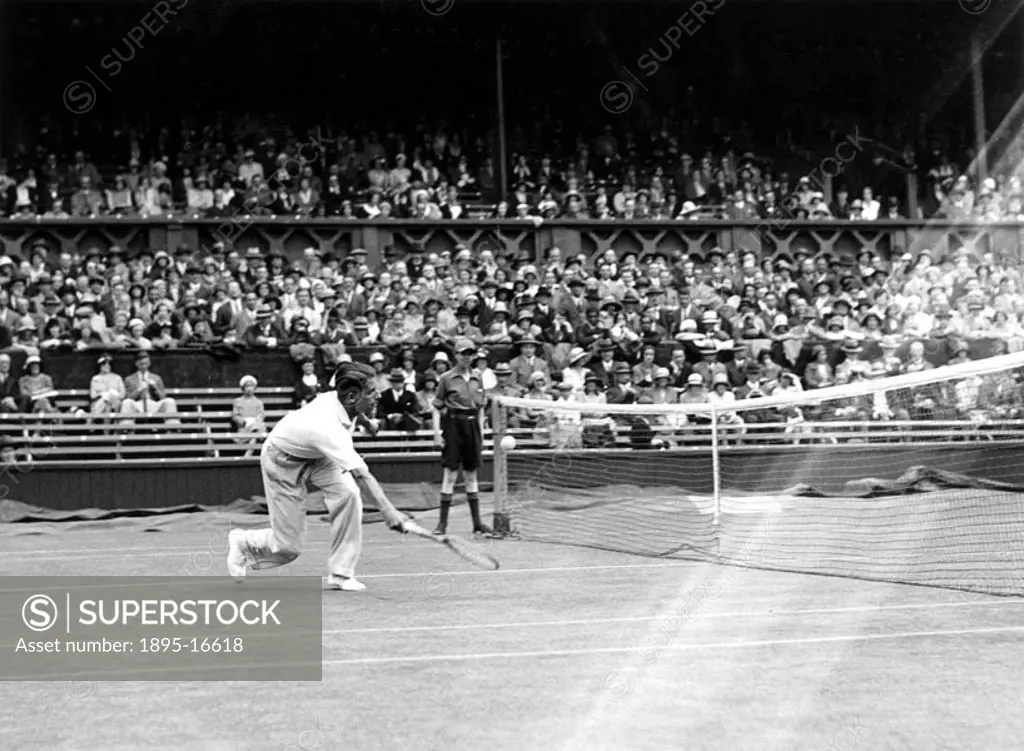 Tennis player Fred Perry in action during the Wimbledon Tennis Championship Tournament, 23 June 1931. During his professional career Fred Perry (1909-...
