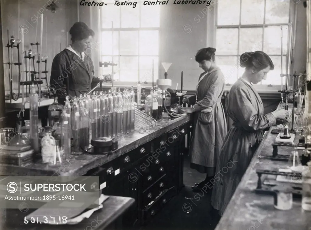 Women workers testing in the central laboratory. A huge cordite explosive factory was built at Gretna in 1915, providing employment for over 9000 wome...