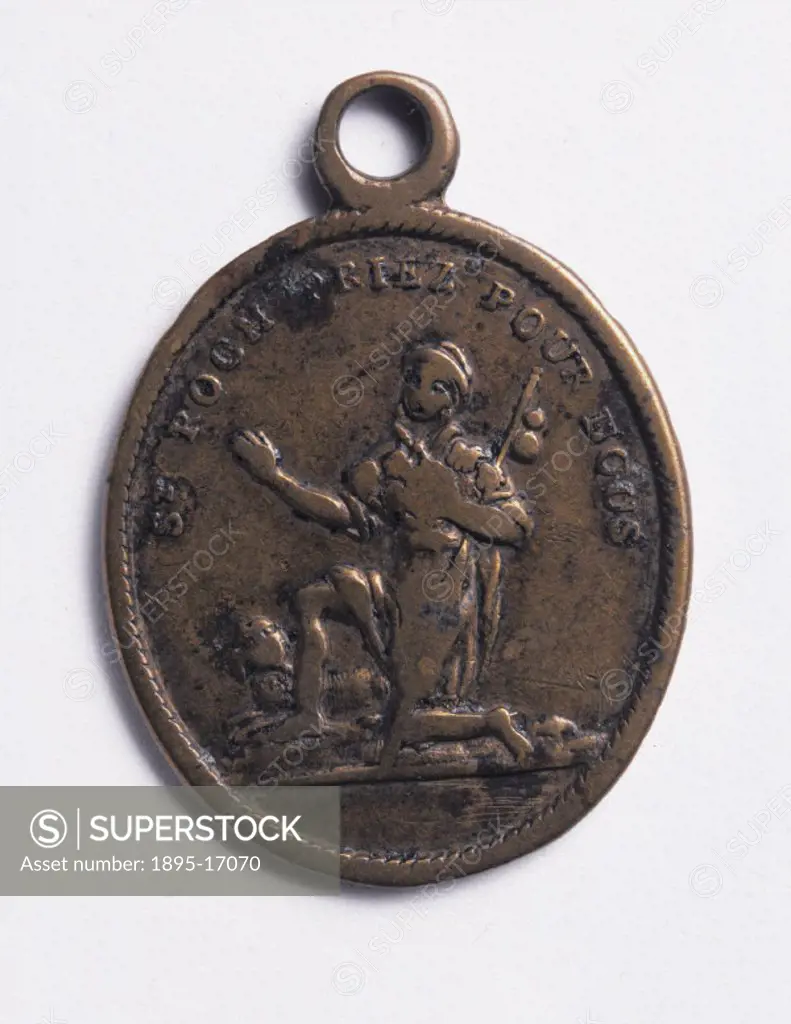 This amulet was made in Belgium or France and is inscribed on the obverse with the words ´St Roch priez pour nous´ (St Roch pray for us’), and on the...