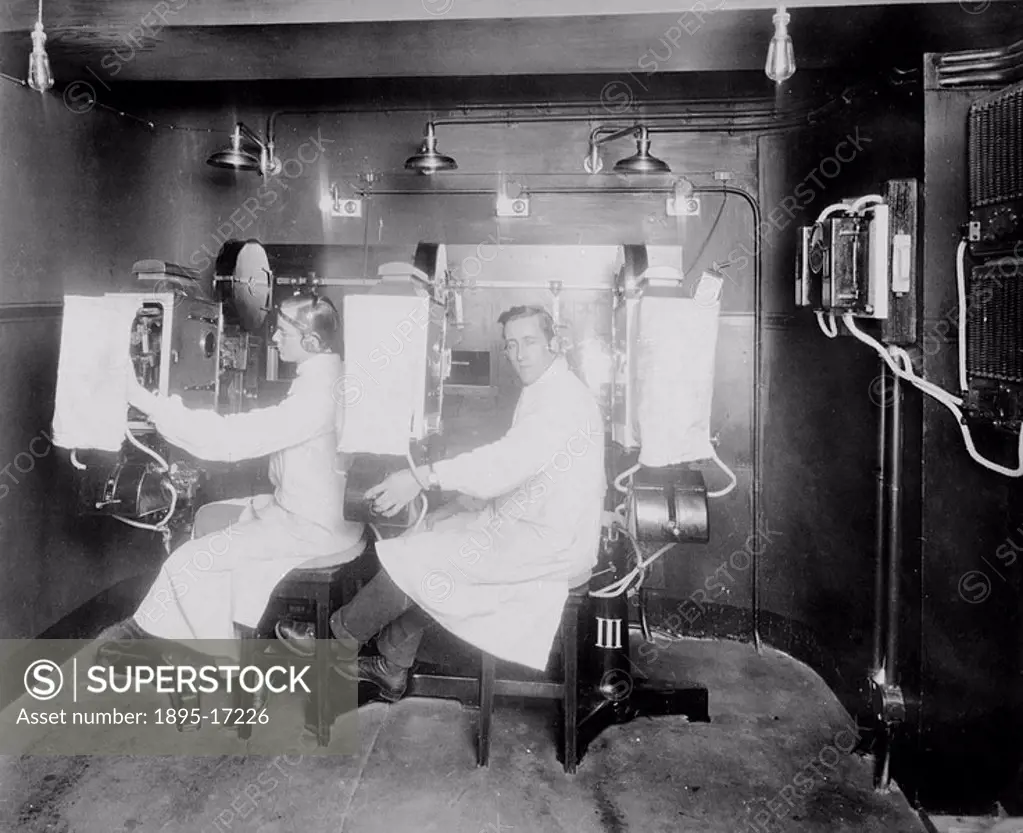 Projection booth with two operators, c 1910s  From the Charles Urban album