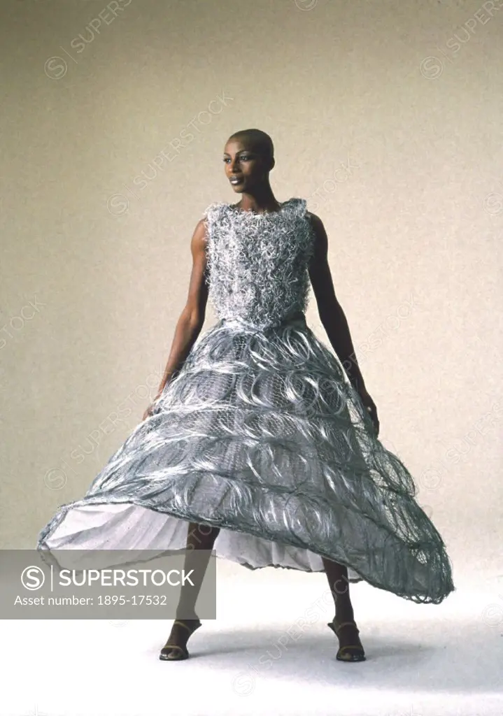 Dress designed by Jeff Banks (b 1943) and made from galvanised steel wire and chicken wire. This was part of a production of The Clothes Show in Warri...