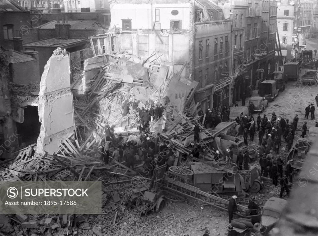 A view of the damage in Central London when a German bomb dropped on a number of small cafes, shops and flats above them on 8 October 1940. Photograph...