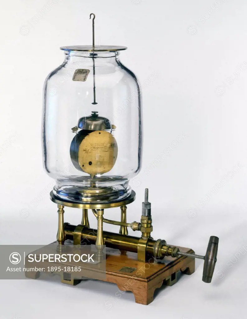 This demonstration equipment consists of a bell jar containing a clockwork brass bell with two hammers. It was used to show that when the air was remo...