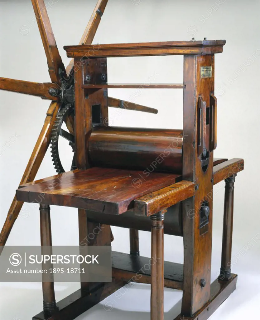 Geared roller copper plate printing press, 18th century. 18th century wooden printing press used by the engraver Charles William Sherborn between 1875...