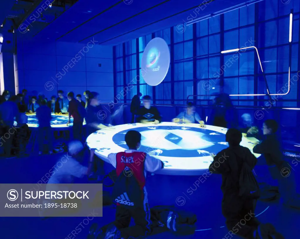 Visitors play on the multi-user interactives forming the ´In Future´ gallery`, located on the third floor of the Wellcome Wing at the Science Museum, ...