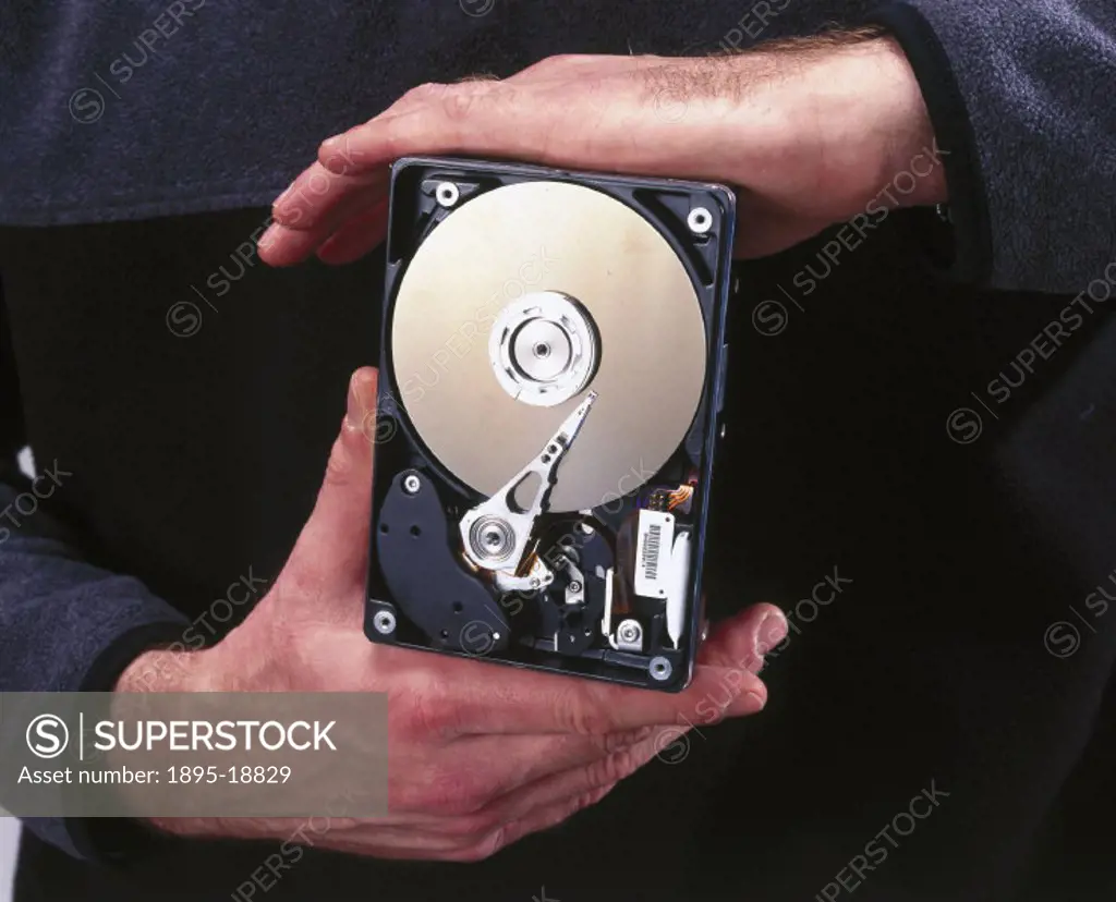The hard drive from a personal computer. Hard disks are rigid non-removable magnetic disks used for storing information in a computer. The first compu...