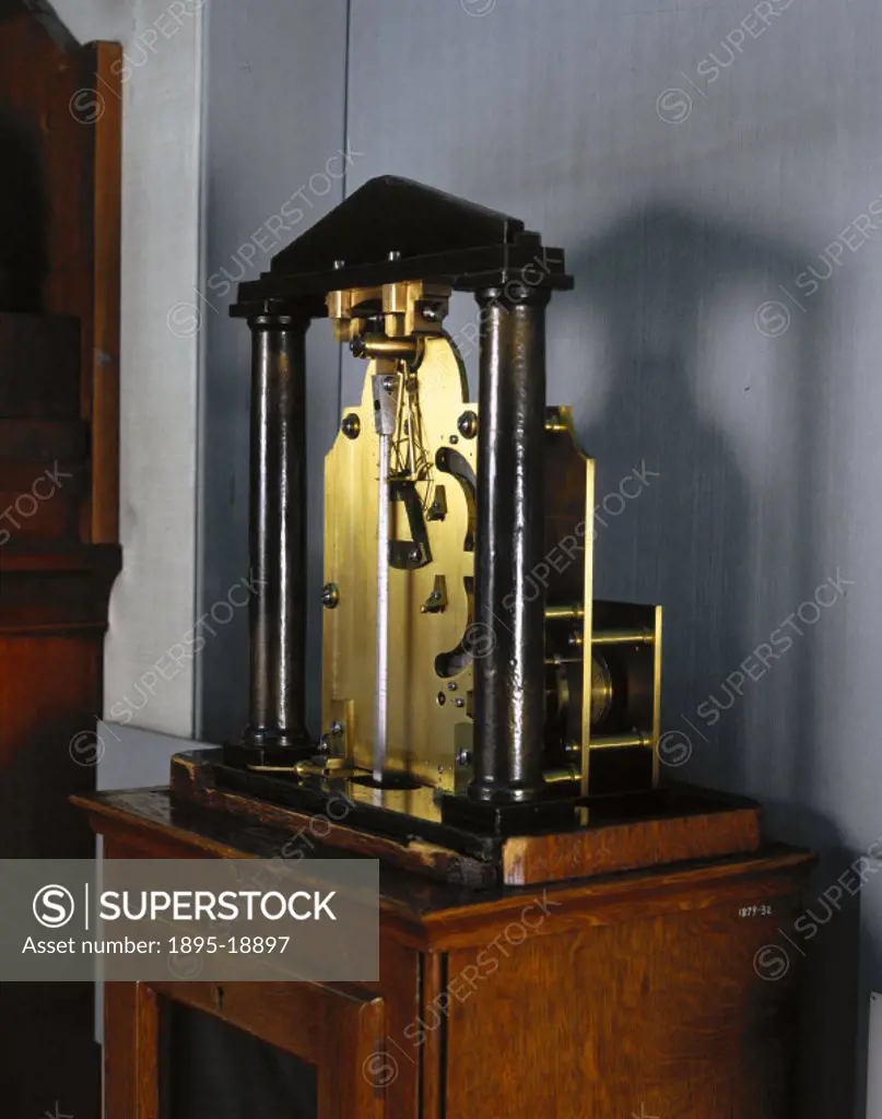 This weight-driven clock with gravity escapement was made by J M Bloxham. In a gravity escapement the wheel train does not act directly on the pendulu...