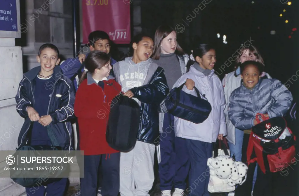 Children arriving at Science Night at the Science Museum, London, 17 November 2000.