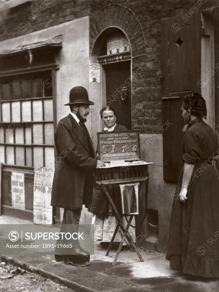 Woodburytype of a man selling Couch Preventative Lozenges in the street, taken from ´Street Life in London´ (1877), written by Adolphe Smith with phot...
