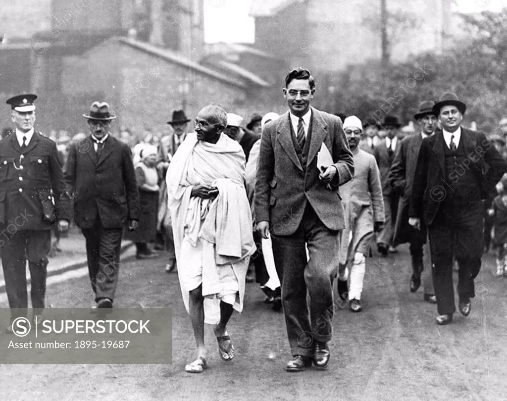 Gandhi during his visit to England  Gandhi 1869-1948 is remembered for his civil disobedience policy against British rule in India and his belief in n...