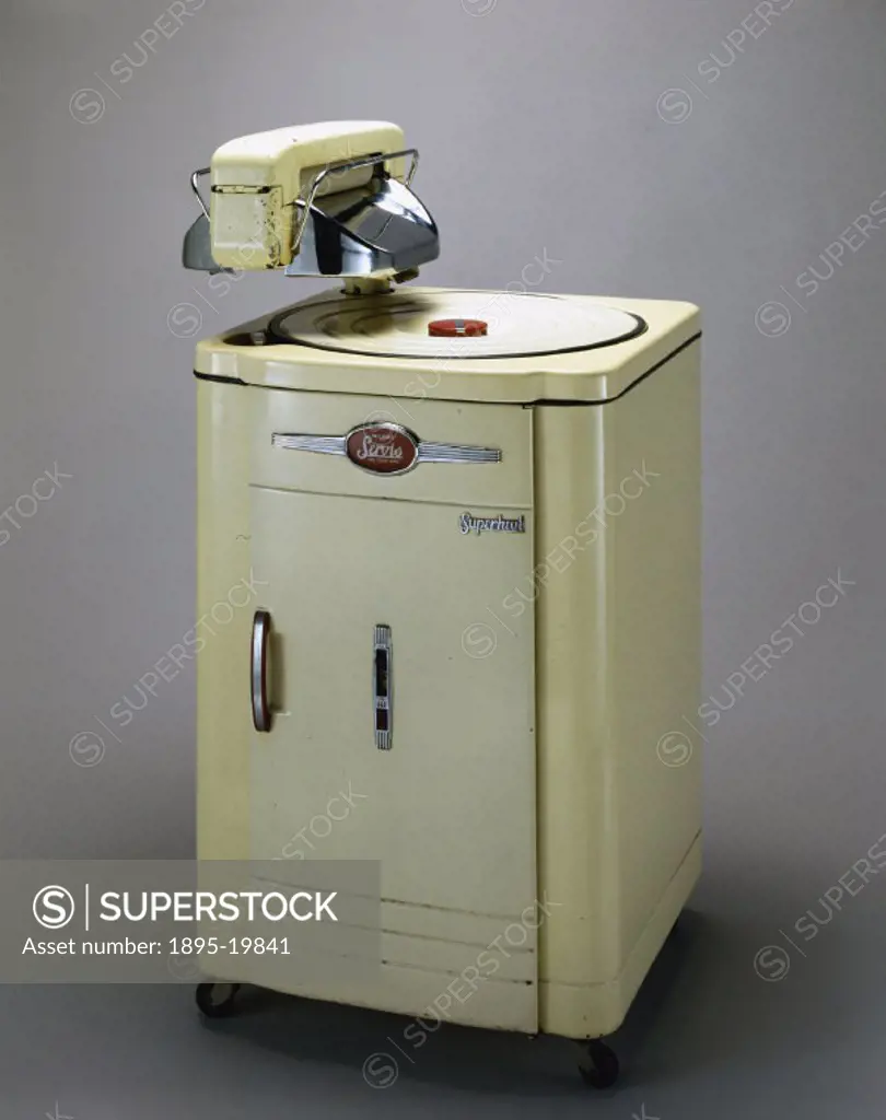 Model ´M´ Mk 14 domestic electric washing machine, serial no 187431, with mountable electric wringer. Made by Wilkins & Mitchell Ltd of Darlaston, Sta...
