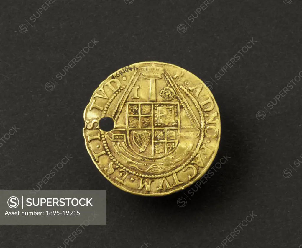 Reverse of a gold touchpiece showing the mint mark. This gold touch piece was issued by James I (1603-1625), and used in the ceremony of healing by to...