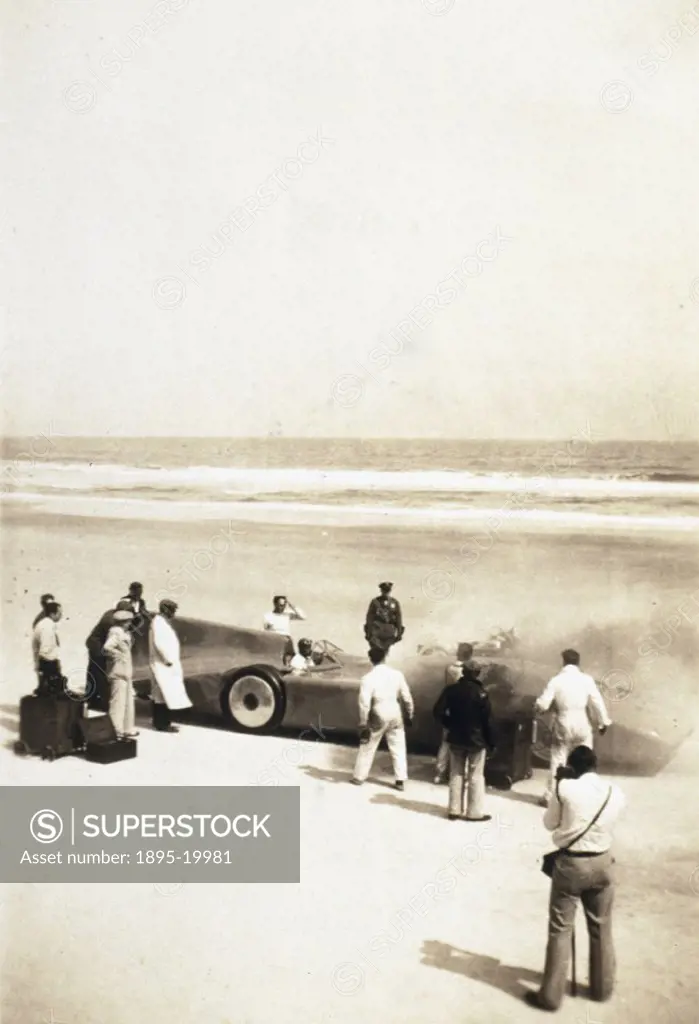 Campbell (1885-1949) at the wheel of the ´Bluebird´ on Daytona Beach, Florida. Campbell was the holder of both land and water speed records from 1927 ...