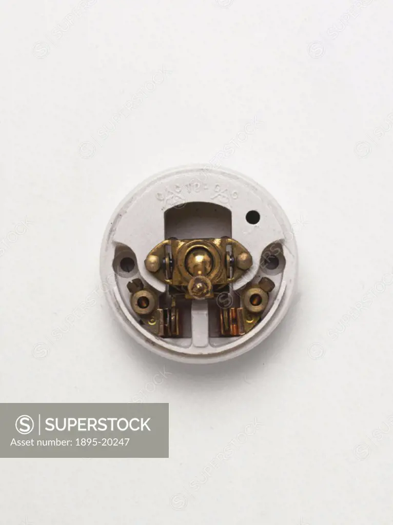 Switch shown in the ´on´ position. The metal components of this early electrical switch are encased in a ceramic body. Two metal arms are sprung so th...