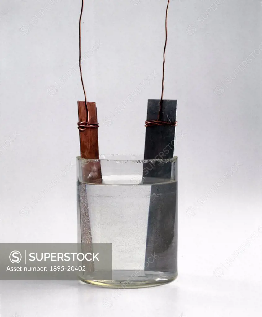 A basic electrical cell consists of copper and zinc plates immersed in sulphuric acid. When the plates are connected by a conducting wire, hydrogen ga...