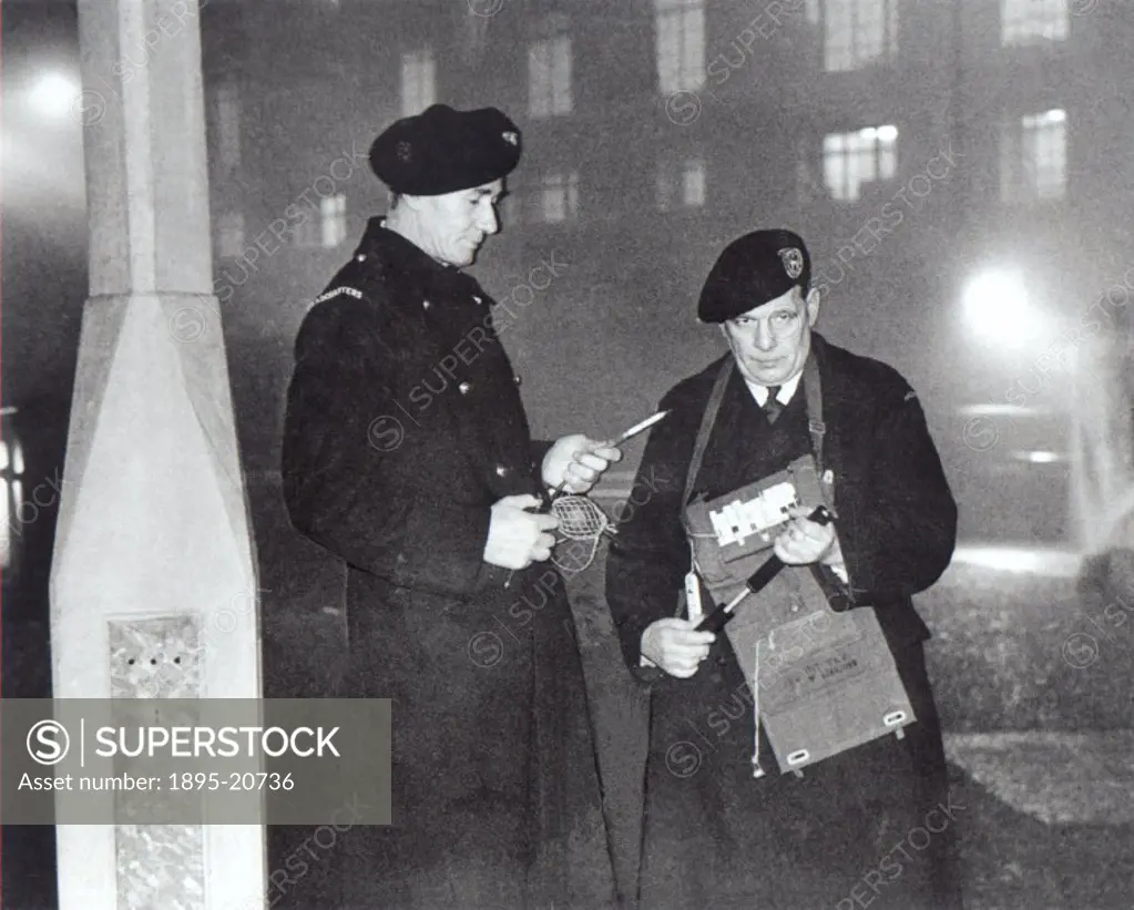 Smog wardens taking chemical readings at Blackfriars in London on 1 December 1955. The original caption reads: ´Two of London´s smog wardens, called o...