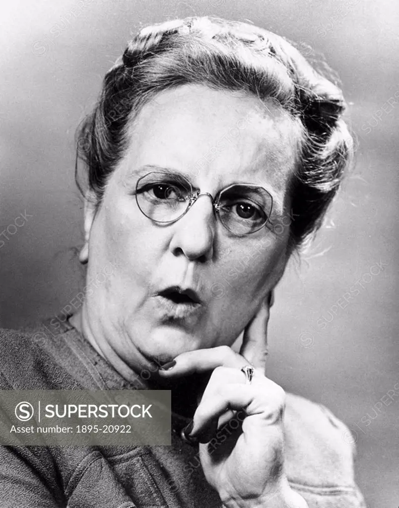 Woman looking surprised, 1940s.Elderly woman wearing pince_nez, expressing disbelief.