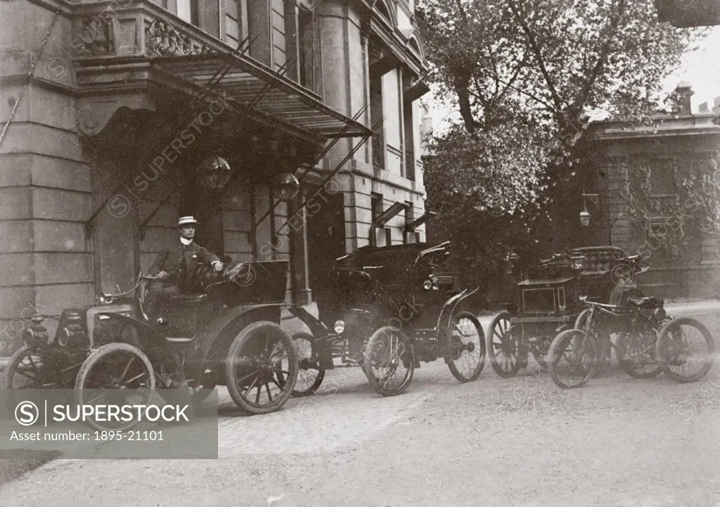 Photograph showing Charles Stewart Rolls (1877-1910) with three motor cars and a Bollee Tri-Car, taken from an album of images compiled by the English...