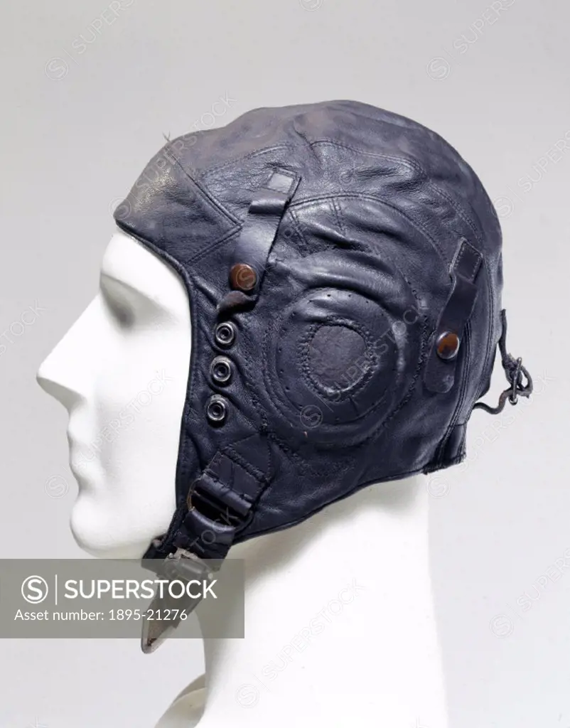 Leather flying helmet type 22C/161 with perforated ear patches. At the outbreak of WWII (1939-1945), flying helmets had changed little since WWI (1914...