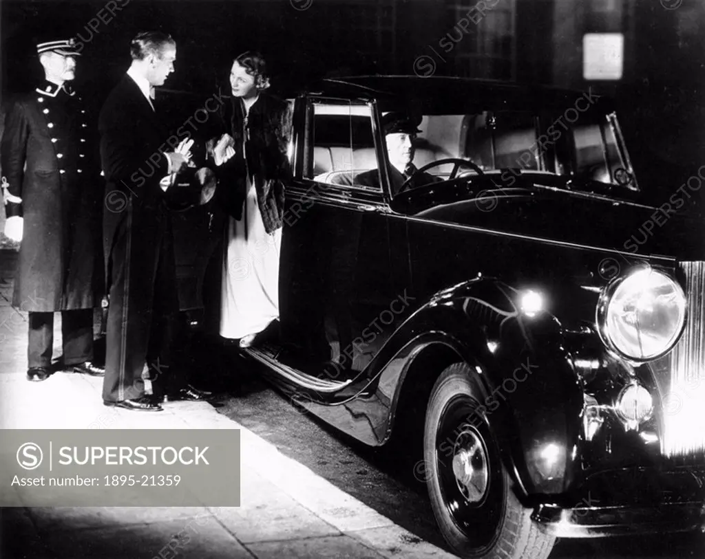 Man helping a woman out of a car, 1940s.Smartly_dressed man escorting his date out of a chauffeur_driven limousine.