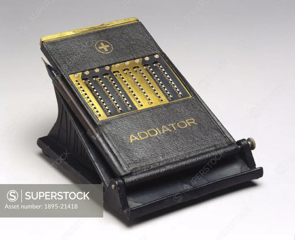 Addiator´ decimal adding machine with stylus and pencil on a metal stand. Made by the Addiator-Gesellshaft Company of Berlin, the ´Addiator´ was a rel...