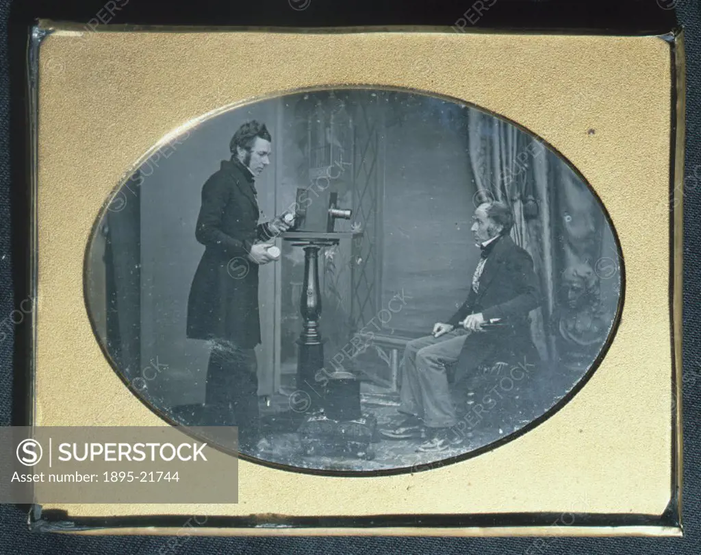 Jabez Hogg (1817-1899) making a portrait in Richard Beard´s studio. Hogg is timing the exposure with his watch. The daguerreotype was probably taken t...